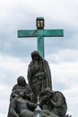 The statue of PietÃÂ , Lamentation of Christ on Charles Bridge , is an outdoor sculpture by Emanuel Max, installed on the south